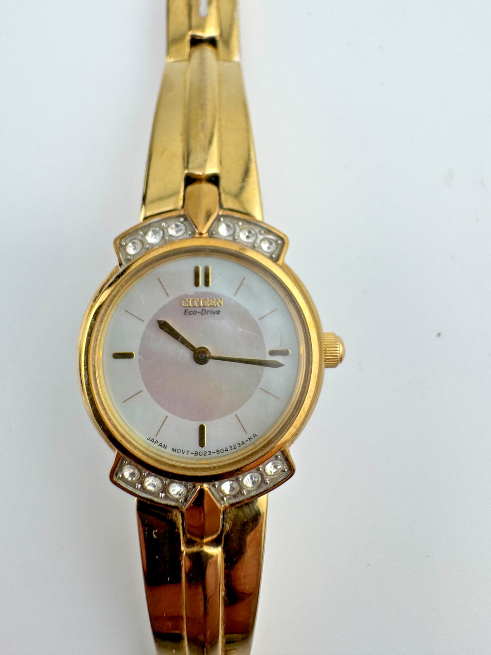 Citizen Eco-Drive Women's Gold Tone Watch Crystal Accent Mother of Pearl Dial